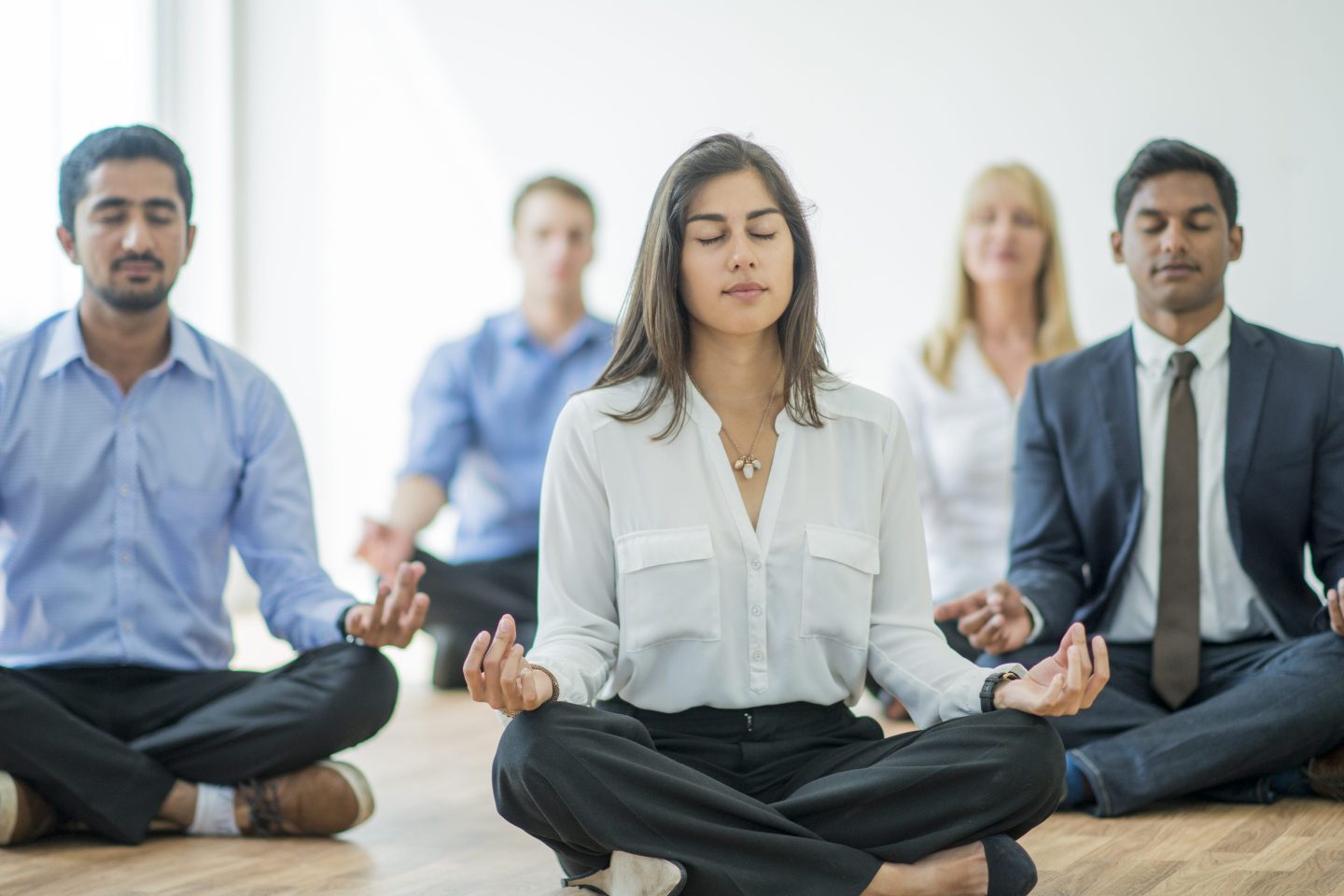 employees meditating at the Office