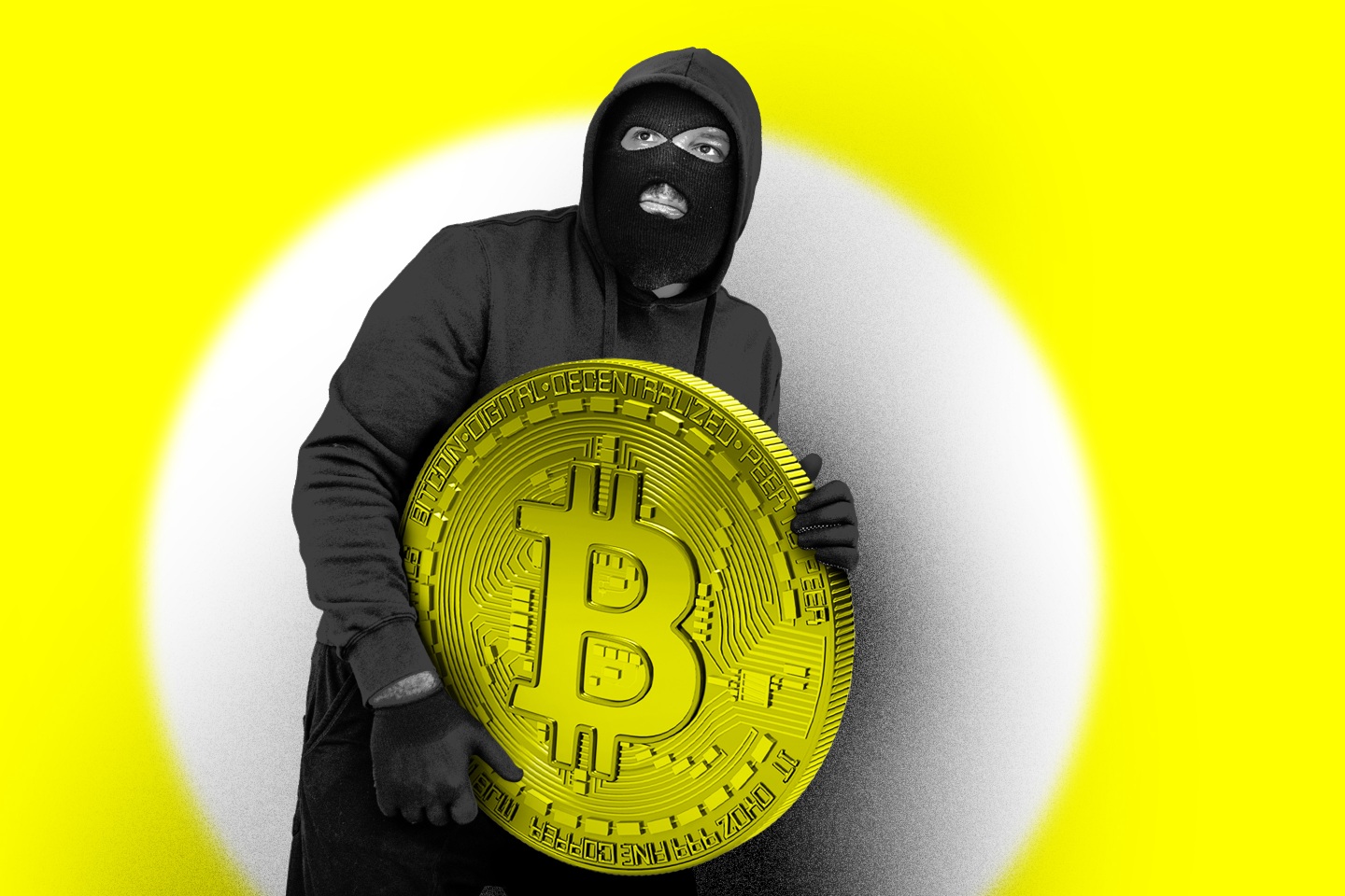 A hooded man carrying a Bitcoin token.