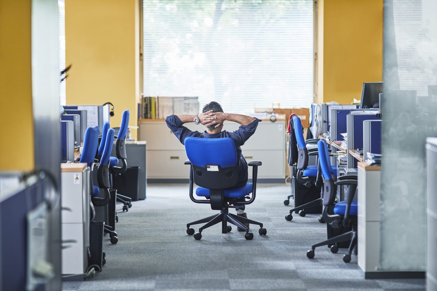 man sat in an empty office