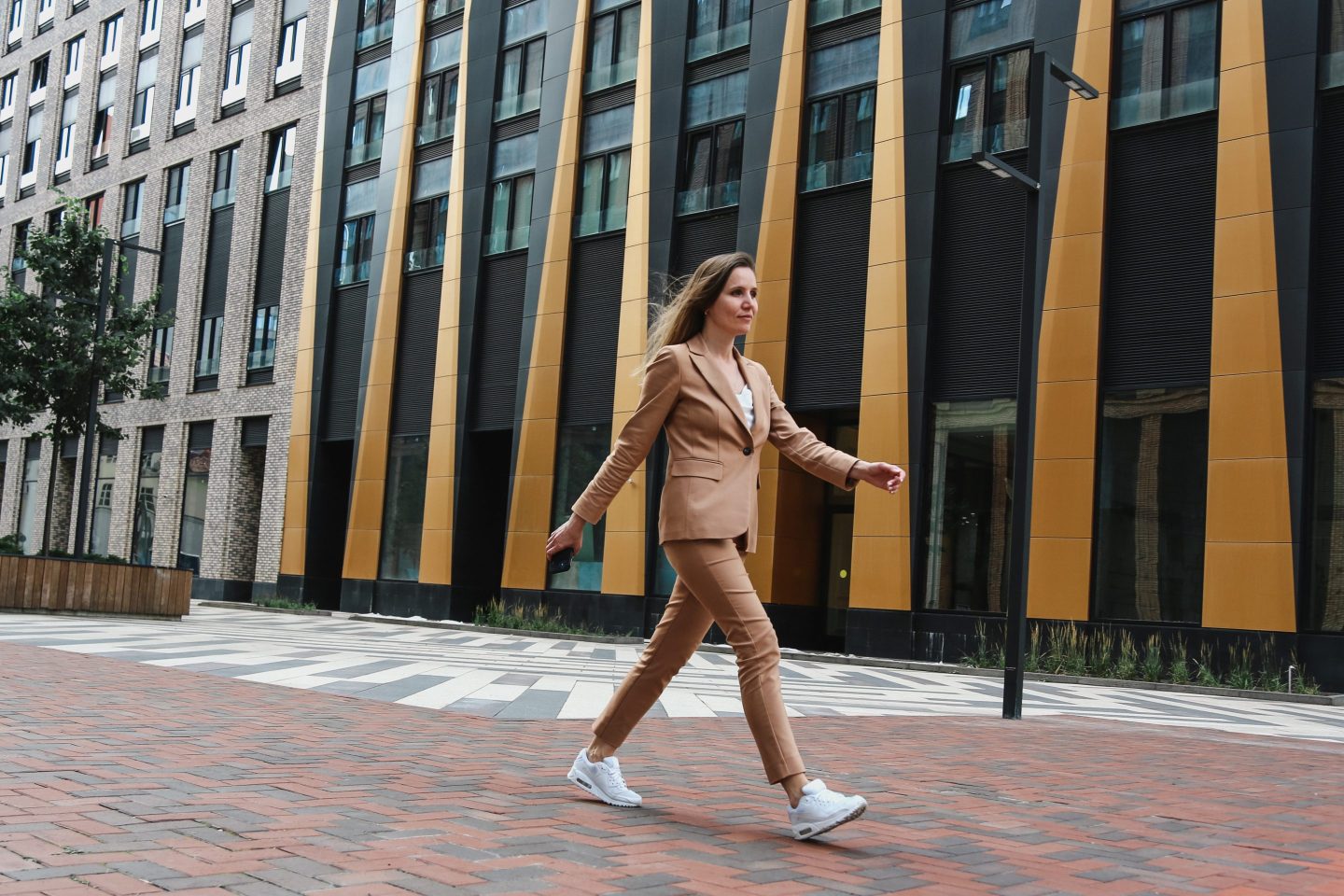 Young women walking in a business district